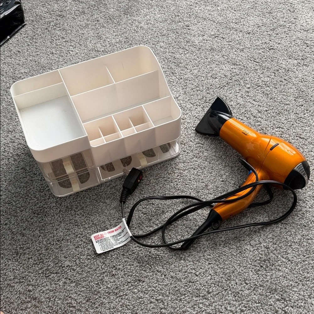 Orange Travel Hair Dryer with Foldable Handle organizer